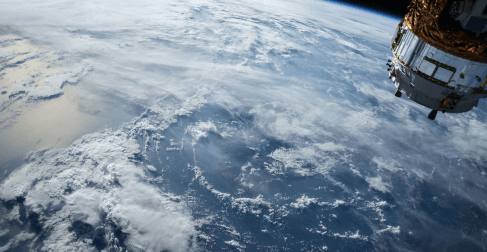 satellite flying over the earth